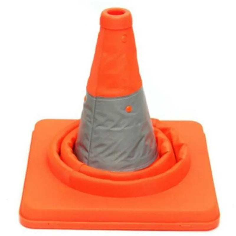 Traffic cone set out beside a vehicle