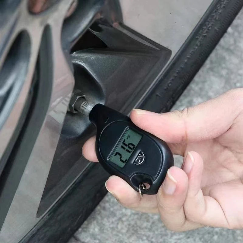 Digital tire pressure gauge with backlit LCD