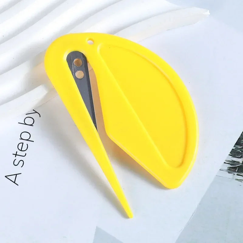 Slitter opening an envelope